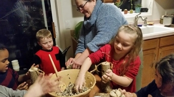 Four kids making food